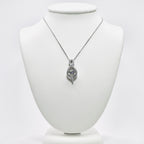 Genuine Sterling Silver Cubic Zirconia Figure 8 with Moving Cubic Zirconia Center Necklace