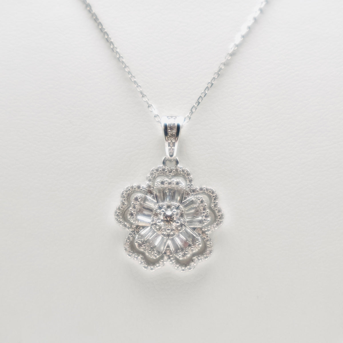 Genuine Sterling Silver flower necklace with clear cubic zirconia baguettes and round cubic zirconias