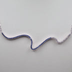 Genuine Sterling Silver Squiggle Line Necklace with clear, sky blue, and dark blue Cubic Zirconia