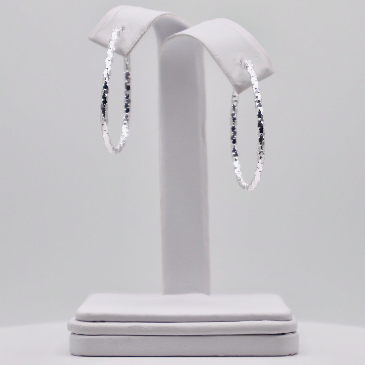Genuine Sterling Silver Silver Diamond Cut Twisted Oval Hoop Earrings - 30mm