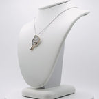 Genuine Sterling Silver Two-Tone Rhodium and Gold-Plated Textured Pickleball Paddle Necklace with Genuine AAA Swiss Blue Topaz Hidden Ball Pendant