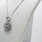 Genuine Sterling Silver flower necklace with clear cubic zirconia baguettes and round cubic zirconias